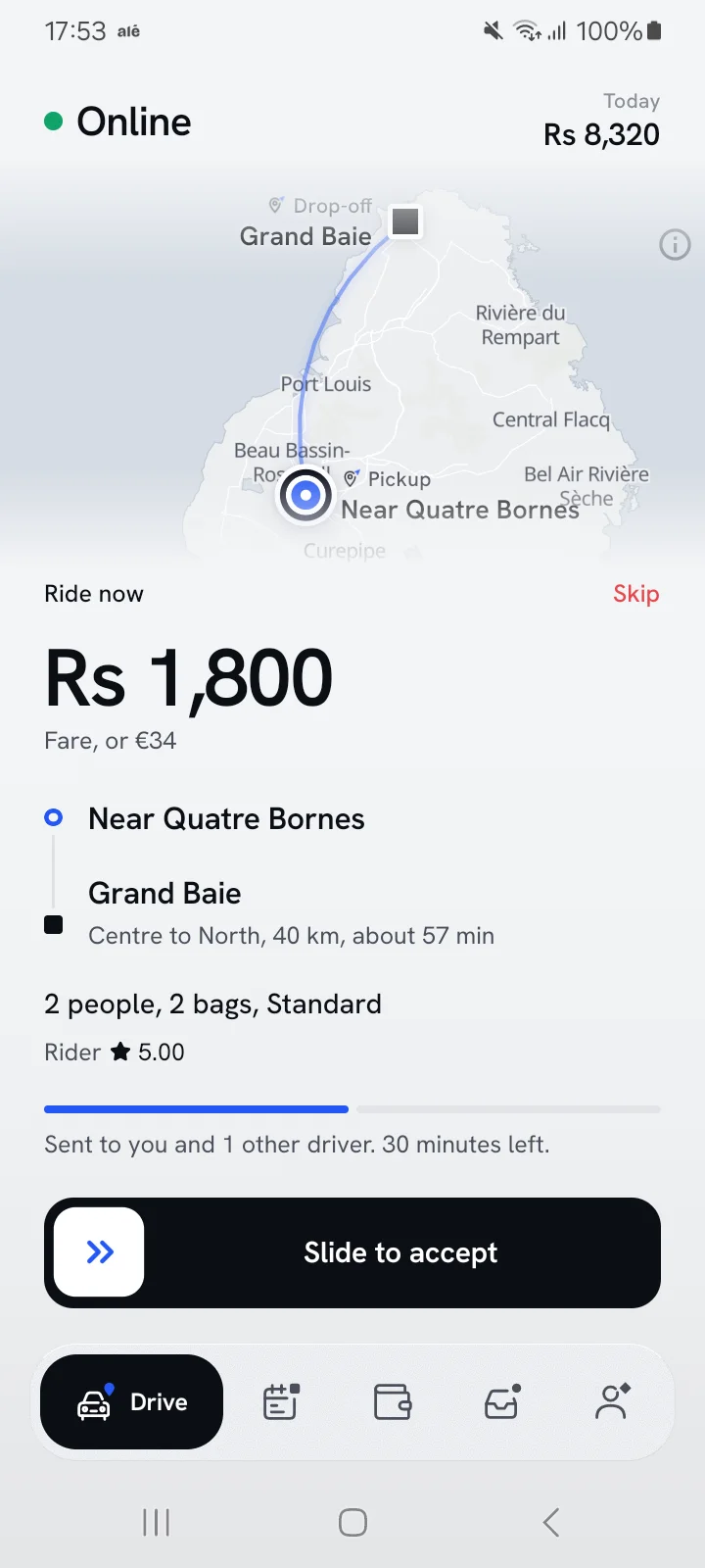 A ride request: Rs 1,800, near Quatre Bornes to Grand Baie, and Slide to accept